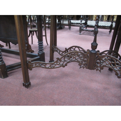 1582 - A Chippendale Style Mahogany Silver Table, with a pierced gallery on square supports, united by pier... 