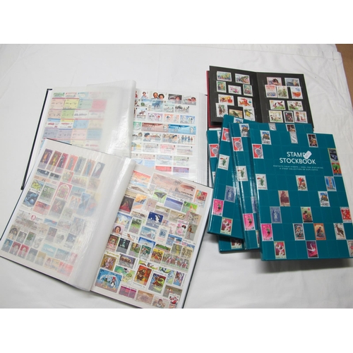 59 - World Accumulation of Mint and Used Stamps, in seven stock books, mainly modern, quantity.