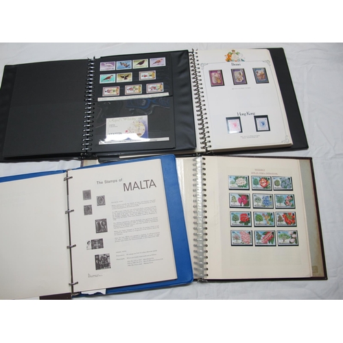 72 - A Collection of Mainly Modern QEII British Commonwealth Stamps, housed in two luxury albums, loose l... 