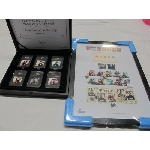 79 - Two Items Containing Stamps Relating to Harry Potter, a collection of mint stamps in a frame and a b... 