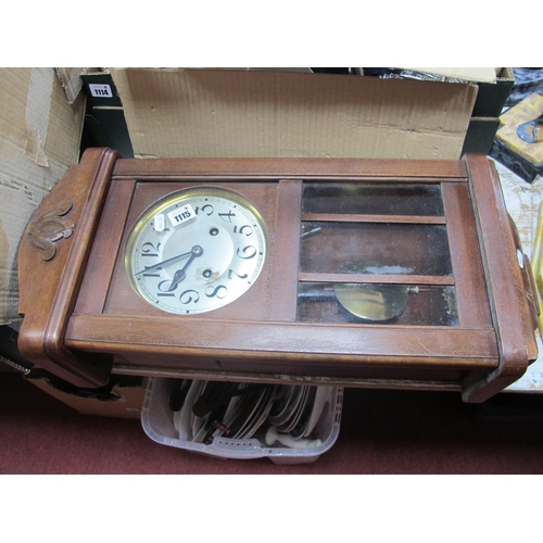 1115 - A 1940's Mahogany Wall Clock, with a silver dial, Arabic numbers, shaped base, 65cm wide.