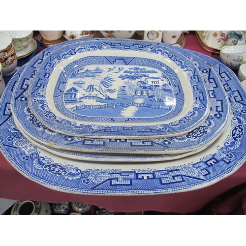 1177 - A XIX Century Blue-White Willow Pattern Meat Plates. (4)