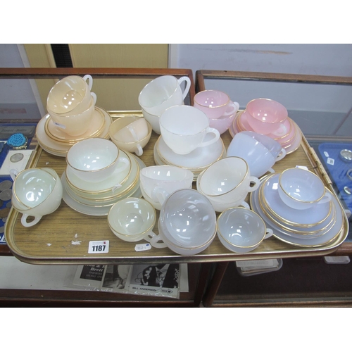 1187 - Arcopal French Lustrous Glass Coffee Cups, tea cups and saucers, etc:- Two Trays.