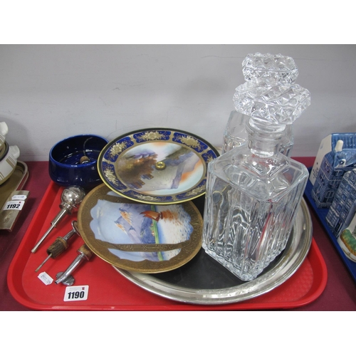 1190 - An Early XX Century Silver Plated Tray, with bakelite base, a pair of mid XX Century glass decanters... 