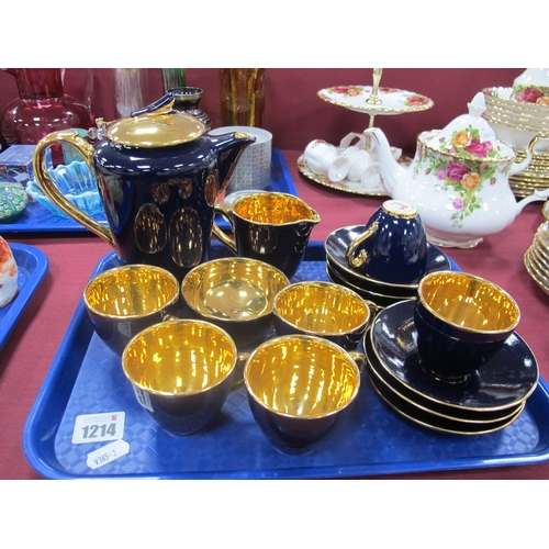 1214 - A Blue Jersey Pottery Coffee Service, with gilt interiors.