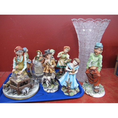 1002 - Nine Capodimonte Figurines, the tallest 24cm, a waisted cut glass vase (damages noted).