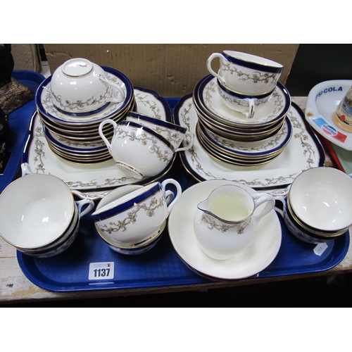 1137 - Couldon Early XX Century Tea Service, with blossom, cobalt blue and gilt borders, numbered 5852, thi... 