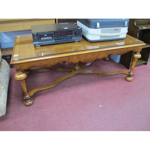 1533 - A XX Century Walnut Rectangular Shaped Coffee Table, top with a moulded edge, feather banding, shape... 