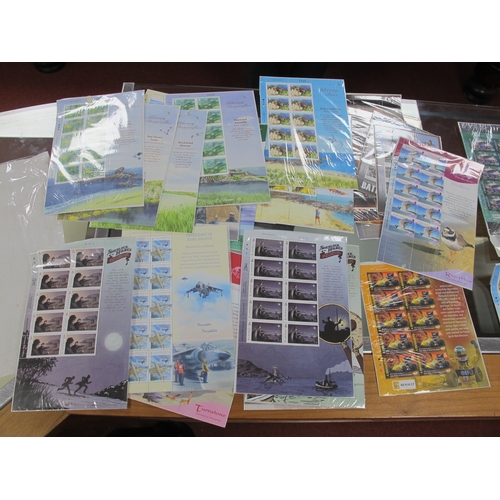 33 - A Large Collection of Guernsey and Alderney Stamps and Mini Sheets, housed in four luxury albums and... 