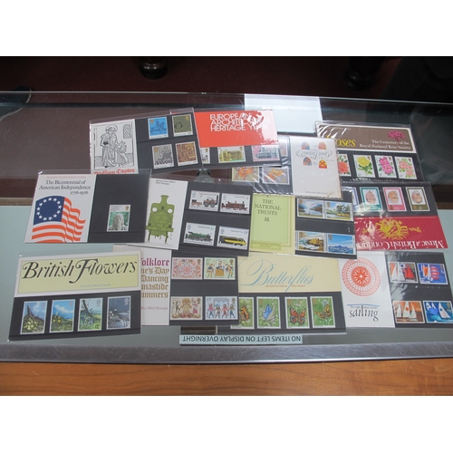 174 - A Collection of Mint GB Presentation Packs, with a face value of over £100.