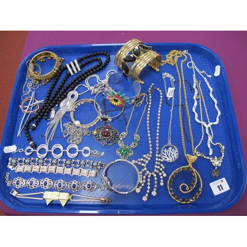 11 - A Mixed Lot of Assorted Costume Jewellery, including diamanté, bangles, bracelets, necklaces, ladies... 