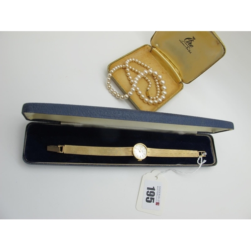 195 - Eterna; A 9ct Gold Cased Ladies Wristwatch, the signed dial with line markers, the case back engrave... 