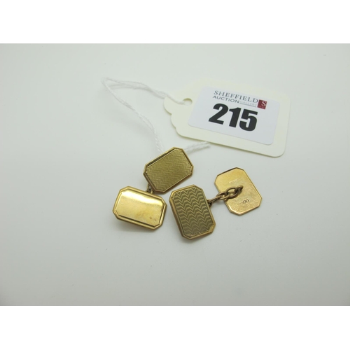 215 - A Pair of 9ct Gold Cufflinks, the rectangular panels, part engine turned, on chain connections (2.8g... 