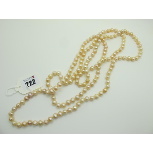 222 - A Long Single Strand Freshwater Pearl Bead Necklace.