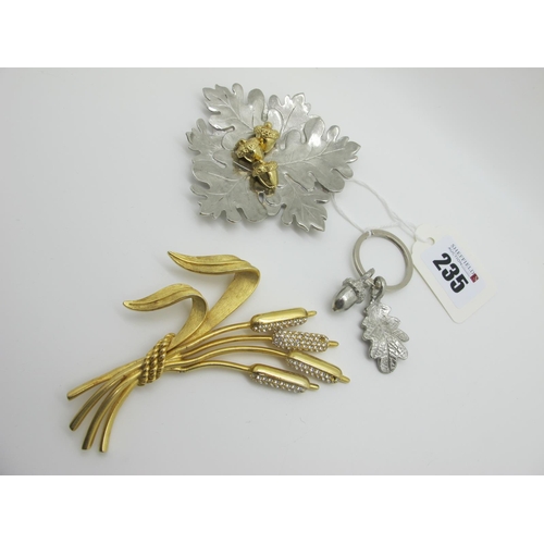 235 - Swarovski; A Large Bulrush Costume Brooch, together with an oak leaf trinket dish with gilt acorns; ... 