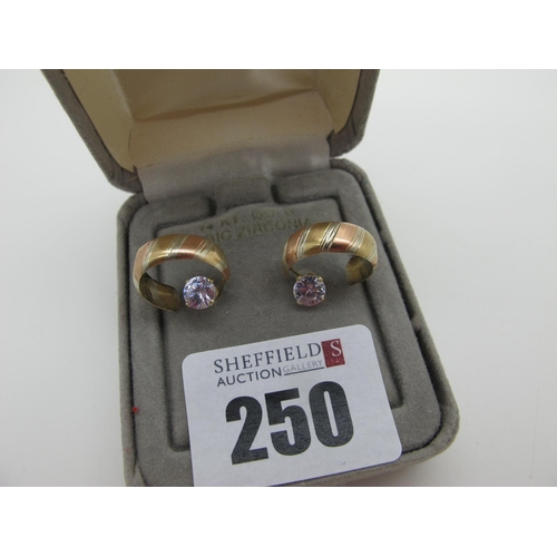 250 - A Pair of Claw Set Earstuds, (lacking butterfly backs) stamped 