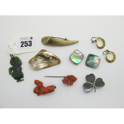 253 - A Maori Green Hardstone Hei-Tiki Pendant, (damaged / loss); together with a carved coral bar brooch ... 