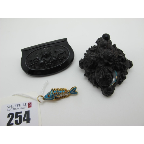 254 - A Victorian Locket Brooch, foliate detailed in relief, swivelling to reveal twin oval apertures; tog... 