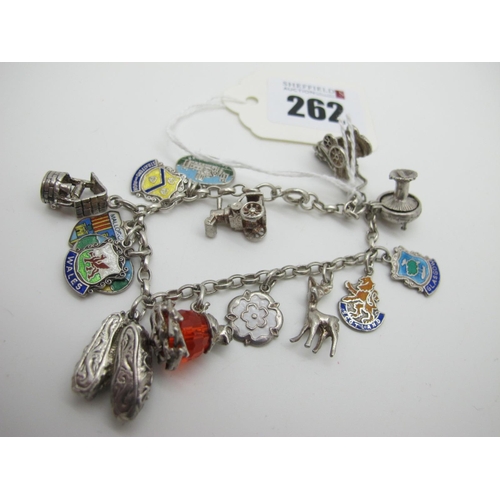 262 - A Dainty Bracelet, suspending assorted novelty charm and souvenir pendants.