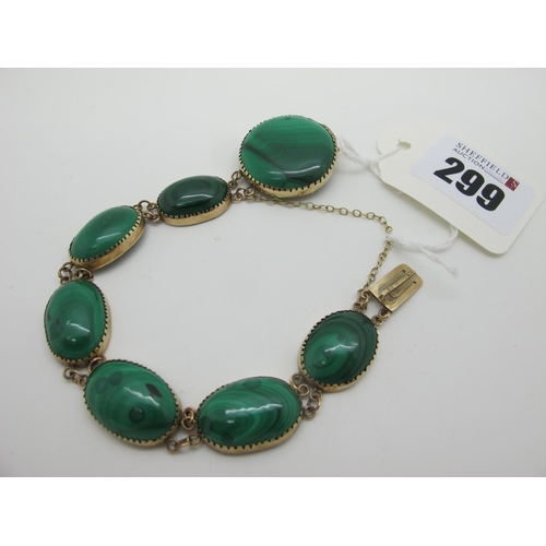 299 - A Vintage Malachite Polished Panel Bracelet, oval and circular collet set, with concealed clasp.