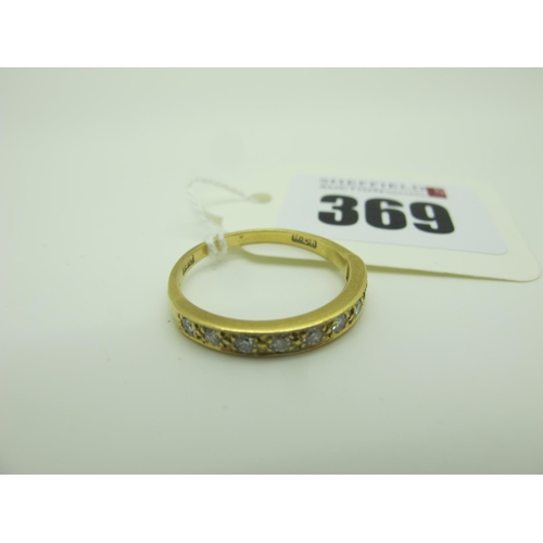 369 - A Diamond Set Half Eternity Style Ring, millegrain set with uniform brilliant cut stones, stamped 