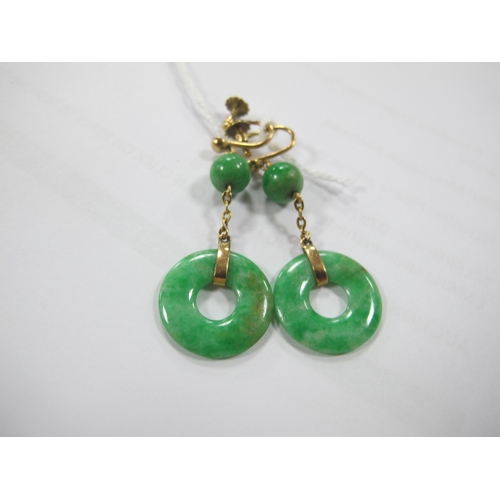 294 - A Pair of c. Early XX Century Green Jade Drop Earrings, each on unpierced screw fitting.  *Safeguard... 