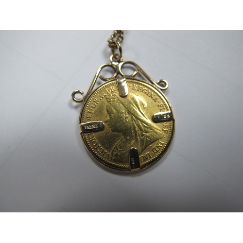 330 - A 9ct Gold Fine Flat Link Curb Chain, 62cm long, suspending a Victoria half Sovereign 1900, loose(?)... 
