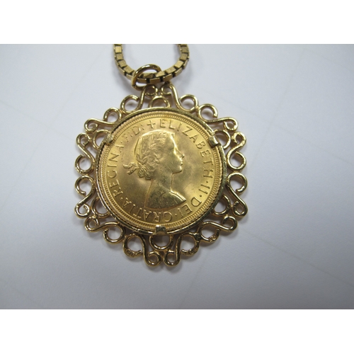 332 - Queen Elizabeth II Sovereign, 1968 (lose/) set within 9ct gold scroll pendant mount, suspended on a ... 