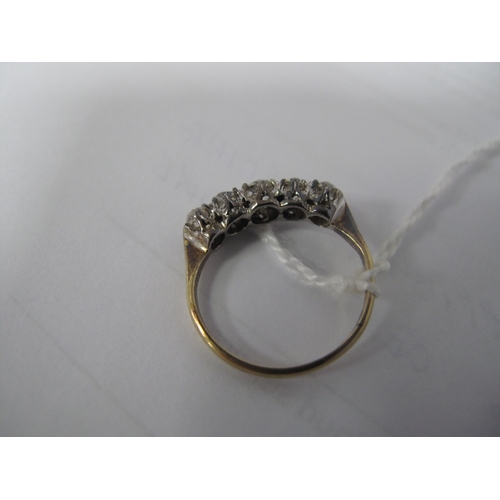 358 - A Five Stone Diamond Ring, the old cut stones claw set between tapered shoulders, stamped 
