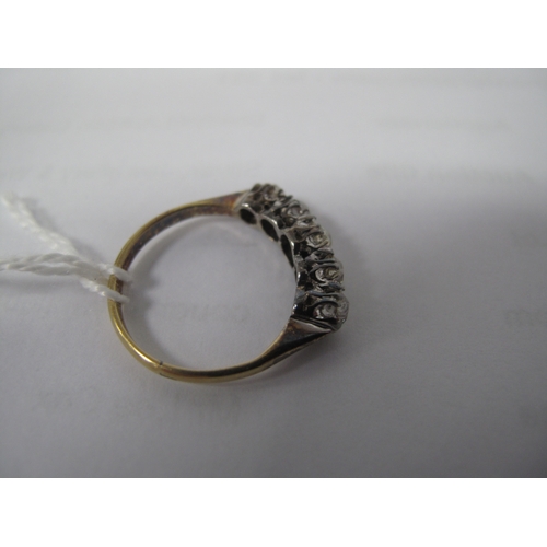 358 - A Five Stone Diamond Ring, the old cut stones claw set between tapered shoulders, stamped 