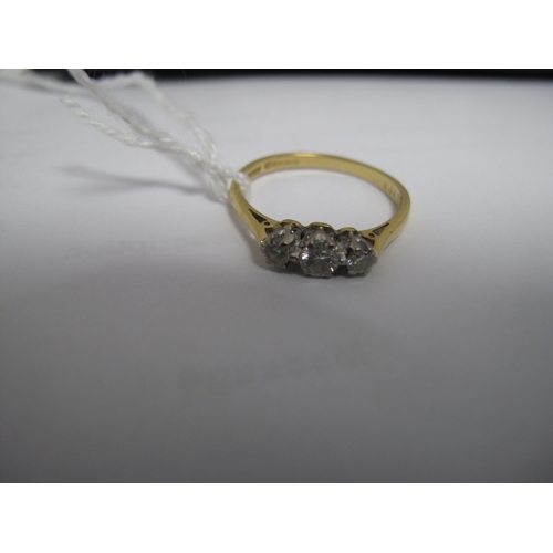 366 - An 18ct Gold Three Stone Diamond Ring, claw set with graduated brilliant cut stones (finger size P) ... 