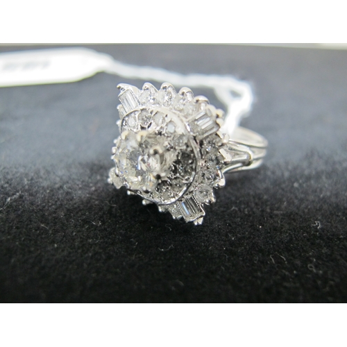 185 - A Large Diamond Cluster Cocktail Ring, claw and collet set throughout with graduated brilliant and b... 