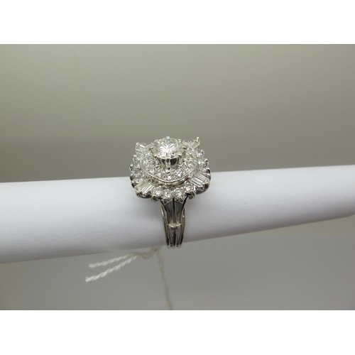 185 - A Large Diamond Cluster Cocktail Ring, claw and collet set throughout with graduated brilliant and b... 