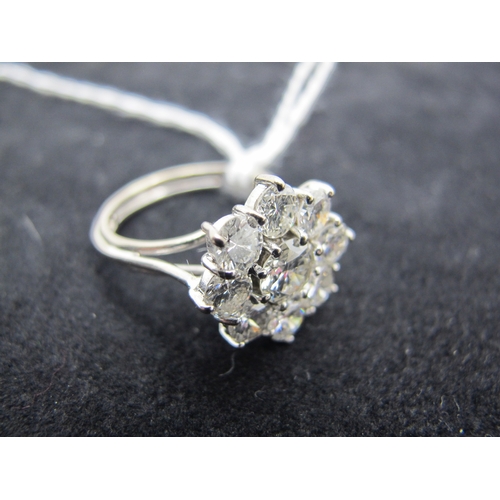 186 - A Large Nine Stone Diamond Cluster Ring, of flowerhead design, claw set with brilliant cut stones (i... 