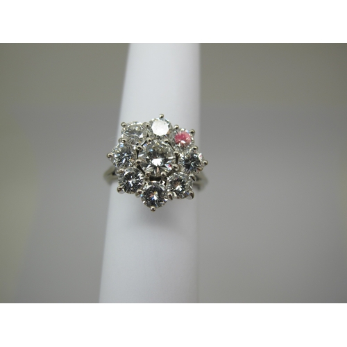 186 - A Large Nine Stone Diamond Cluster Ring, of flowerhead design, claw set with brilliant cut stones (i... 