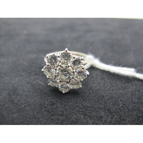 186 - A Large Nine Stone Diamond Cluster Ring, of flowerhead design, claw set with brilliant cut stones (i... 