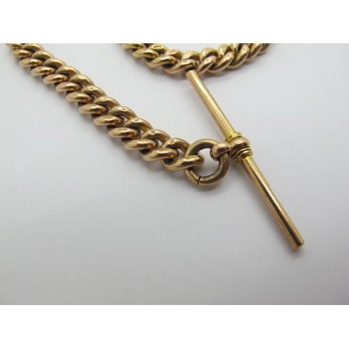 227 - A 9ct Gold Curb Link Albert Chain, to single swivel clasp, suspending a T-bar, 19.5cm long (27.5gram... 