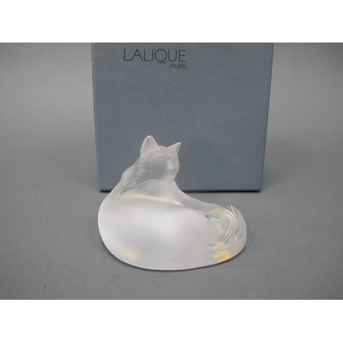 1014 - A Modern Lalique 'Happy' Cat, in frosted glass, modelled as a recumbent cat, etched mark, boxed with... 