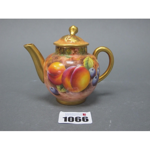 1066 - A Royal Worcester Porcelain Miniature Teapot and Cover, of globular form with flower knop, painted b... 