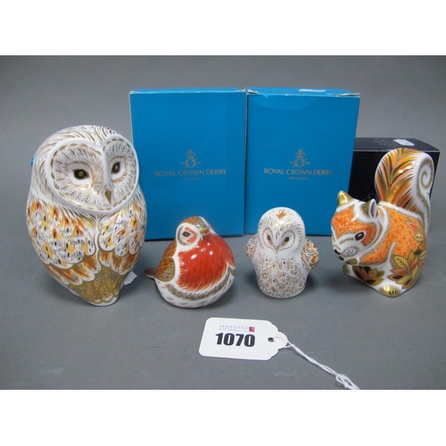 1070 - Four Royal Crown Derby Porcelain Paperweights, 'Winter Owl', 'Royal Robin', 'Autumn Squirrel' and 'W... 