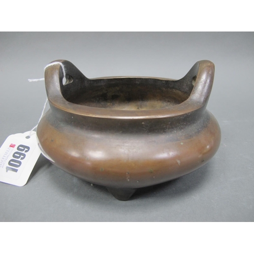 1099 - A Chinese Bronze Tripod Censer, of two handled circular form, six character mark to base, 12.5cm dia... 