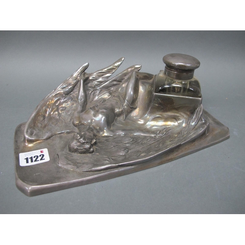 1122 - An Early XX Century Pewter WMF Style Desk Standish, the shaped rectangular base cast with a winged f... 