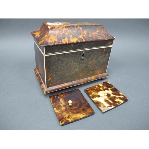 1134 - A Regency Tortoiseshell Tea Caddy, of sarcophagus form raised on bun feet, the interior with two com... 