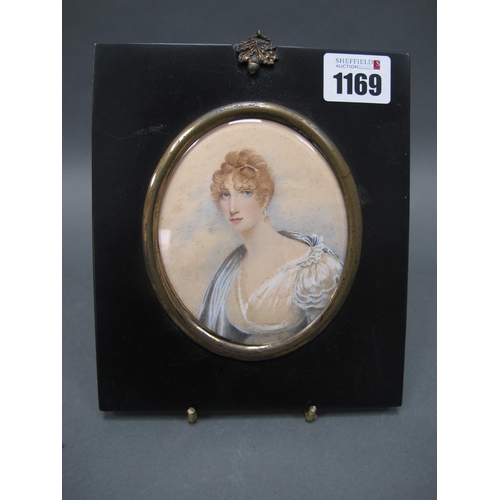 1169 - A Mid XIX Century Oval Portrait Miniature, painted with a head and shoulders portrait of a lady wear... 