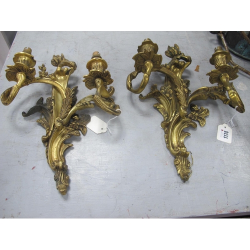 1174 - A Pair of Mid XX Century Gilded Metal Two Branch Wall Lights, of scrolling floral and foliate design... 