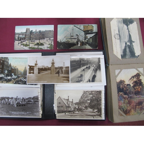 1192 - Two Albums of Early XX Century Picture Postcards and Photographs, to include; WWI silk, topographica... 