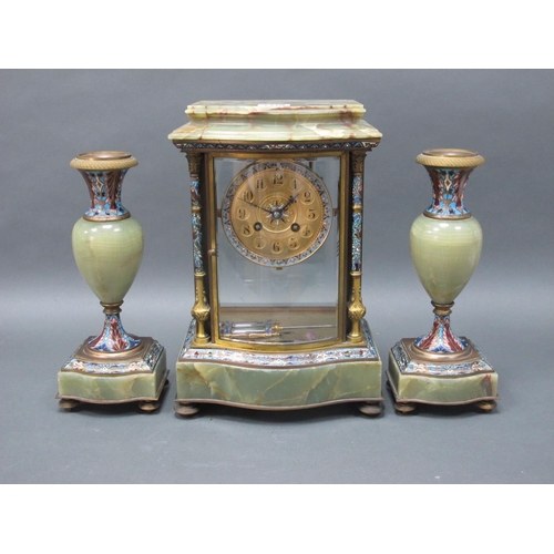 1418 - A French Mid XIX Century Onyx and Champléve Enamel Clock Garniture, the clock of serpentine form wit... 