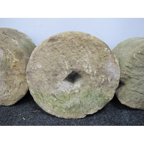 1429 - A Weathered Stone Millstone, 46cm wide.