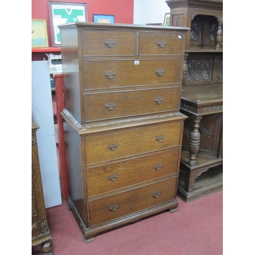 1445 - A XX Century Oak Chest on Stand, the top with two small and three long drawers, the base with three ... 