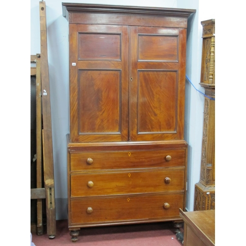 1448 - A XIX Century Mahogany Linen Press, with moulded cornice above twin panelled doors with four interna... 